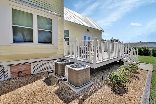 wooden terrace with central air condition unit