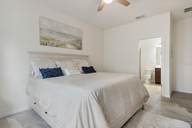 bedroom featuring ceiling fan and ensuite bathroom