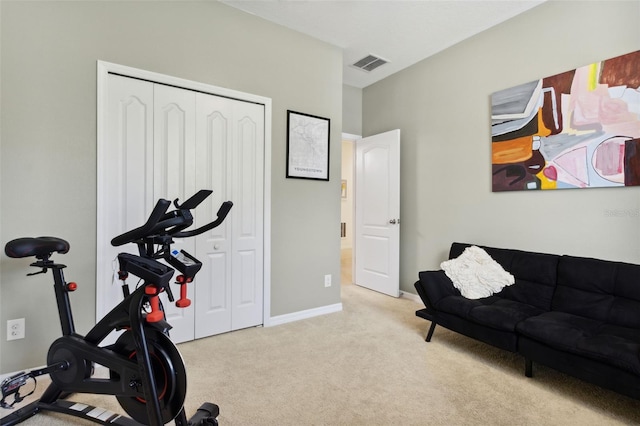 workout area with light colored carpet