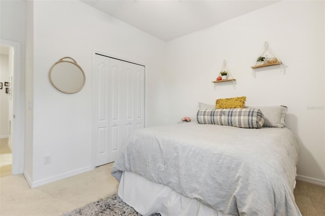 carpeted bedroom with a closet