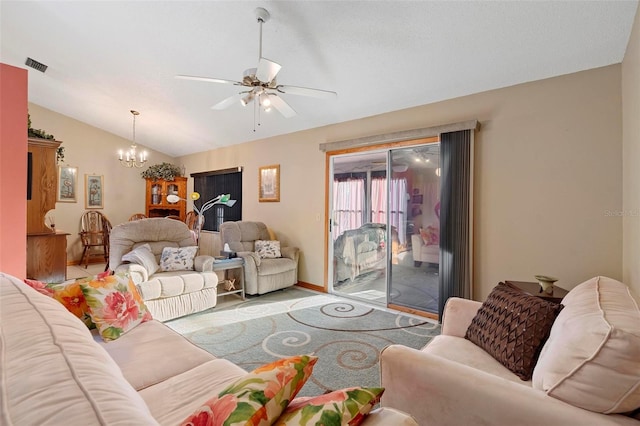 living room with lofted ceiling and ceiling fan with notable chandelier