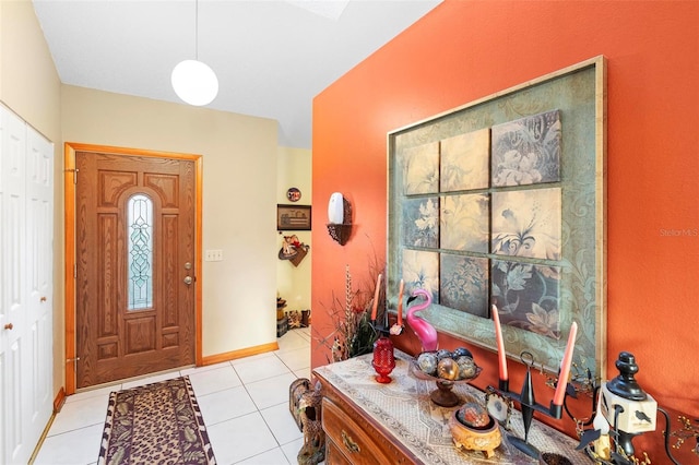 foyer with light tile patterned flooring