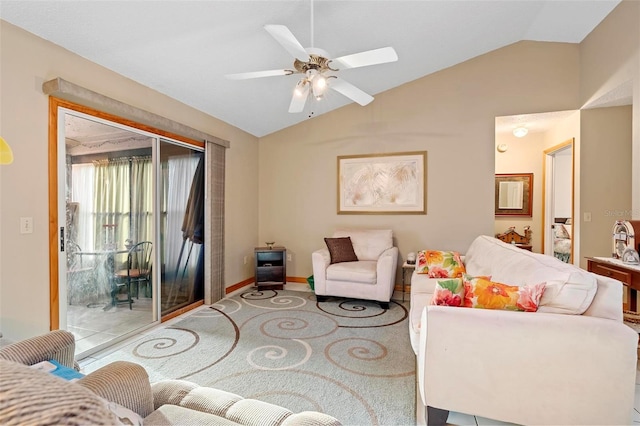 living room with ceiling fan and lofted ceiling