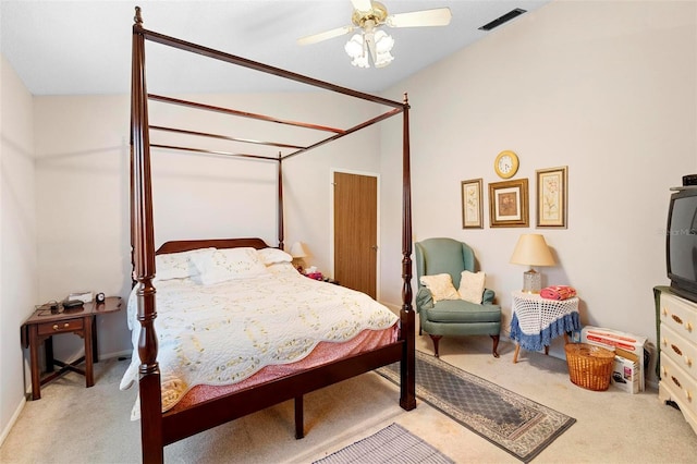 bedroom with ceiling fan and light carpet