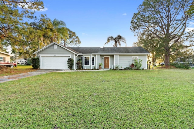 ranch-style home featuring a front yard and a garage