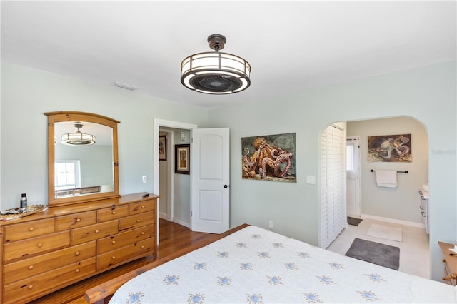 bedroom featuring hardwood / wood-style floors