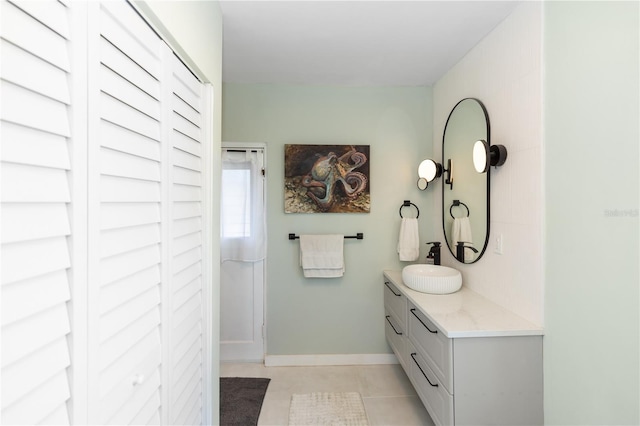 bathroom featuring tile patterned floors and vanity