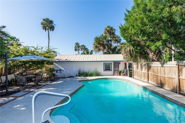 view of pool with a patio