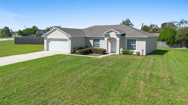 ranch-style house featuring a front lawn and a garage