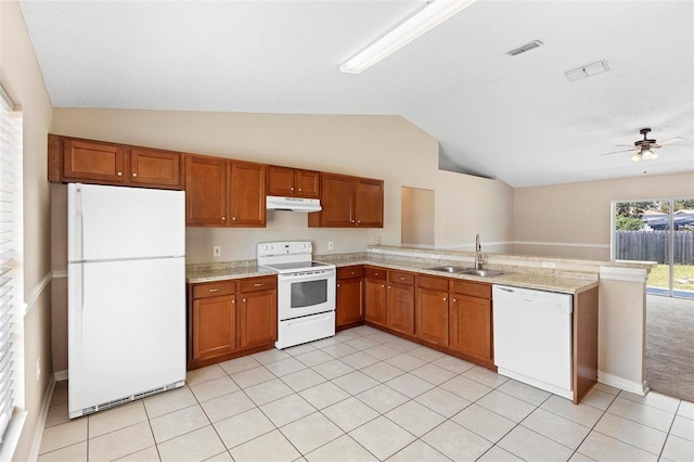 kitchen featuring kitchen peninsula, white appliances, vaulted ceiling, ceiling fan, and sink