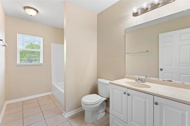 full bathroom with tile patterned floors, vanity, toilet, and tub / shower combination