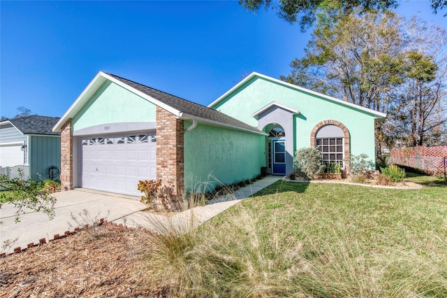 ranch-style house with a front lawn and a garage