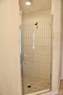 bathroom with an enclosed shower