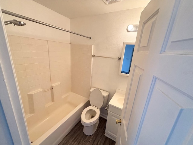 full bathroom with wood-type flooring, vanity, toilet, and shower / bathtub combination