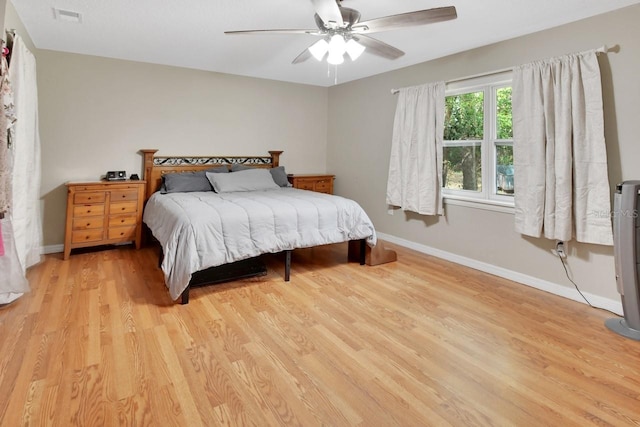 bedroom featuring ceiling fan and light hardwood / wood-style flooring