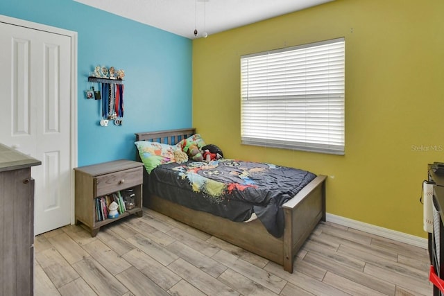 bedroom featuring light hardwood / wood-style flooring