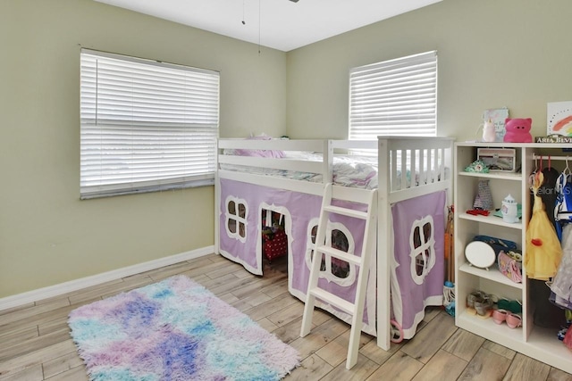 bedroom with light hardwood / wood-style flooring