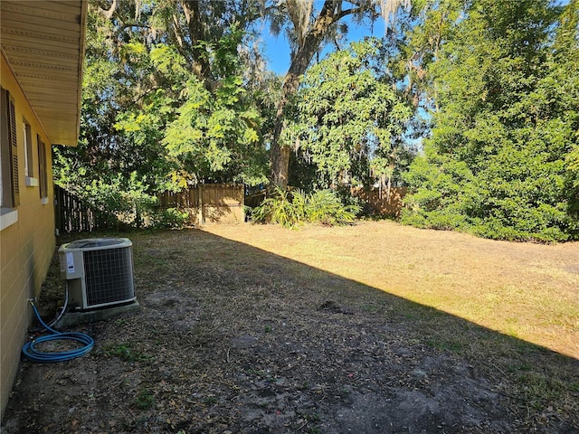 view of yard featuring central AC unit