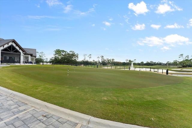 surrounding community featuring a water view