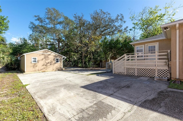 view of patio with a wooden deck