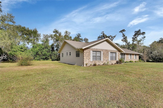 view of property exterior with a yard