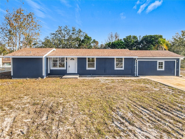 ranch-style home featuring a front lawn