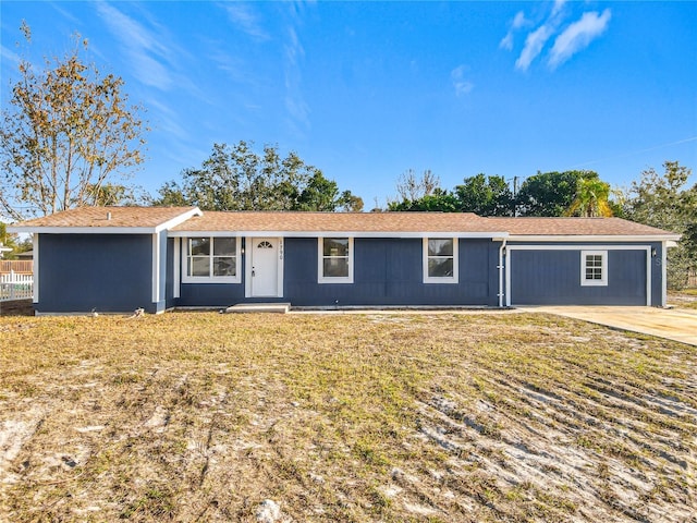 ranch-style home with a front yard