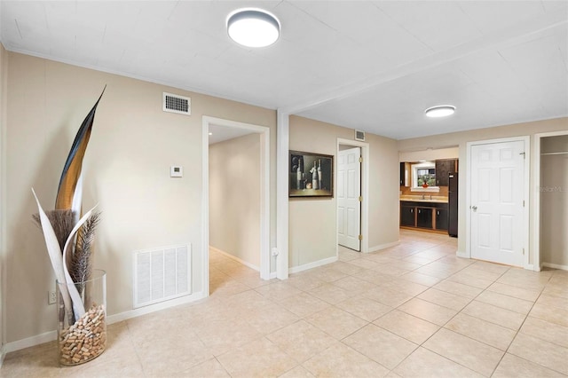 view of tiled spare room