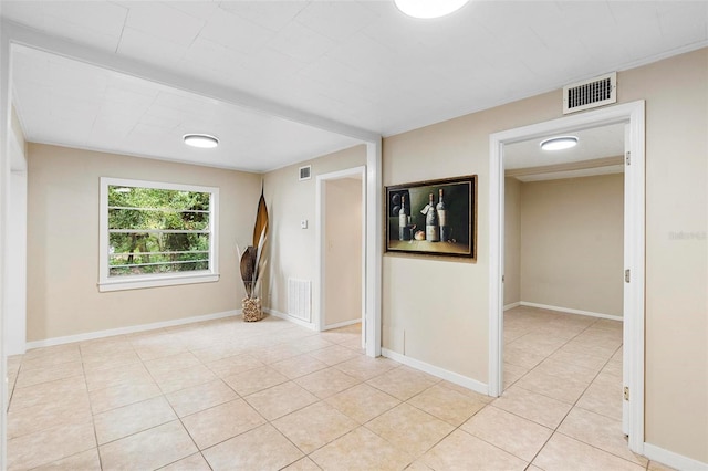 view of tiled spare room