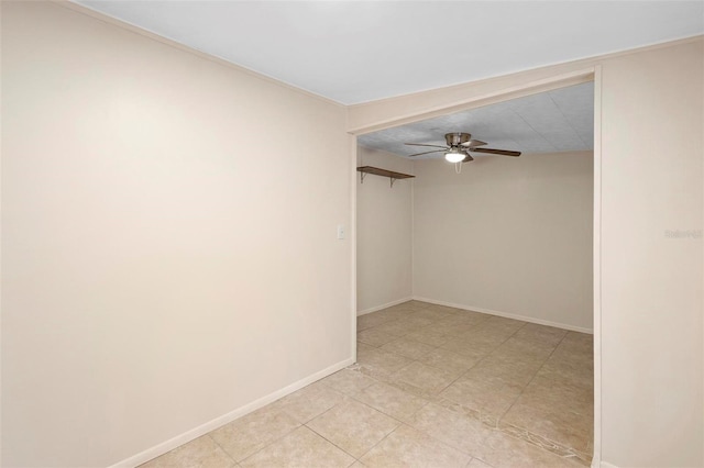 unfurnished room with ceiling fan