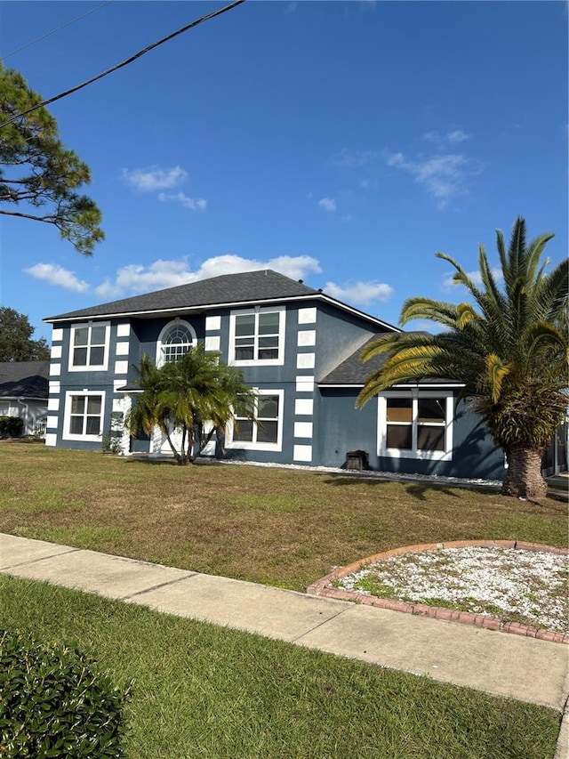 view of front of property with a front yard