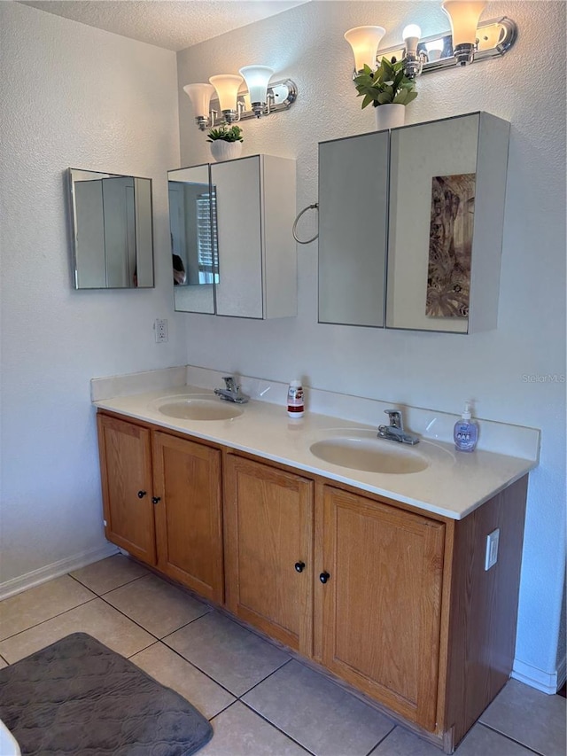 bathroom with vanity and tile patterned floors