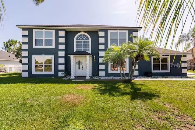 view of front of house featuring a front lawn