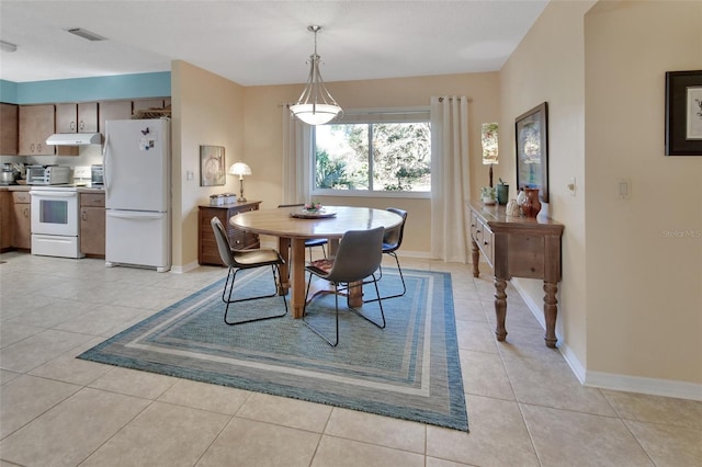 dining room with light tile patterned floors