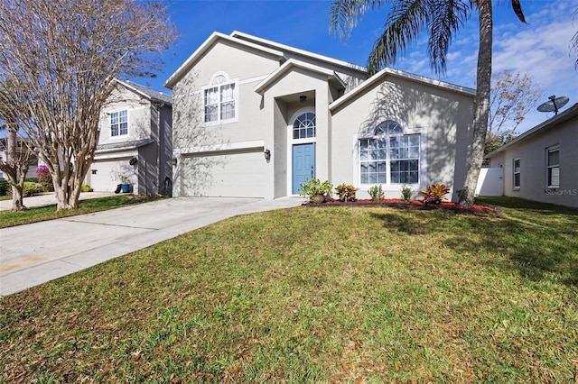 front facade featuring a front lawn and a garage