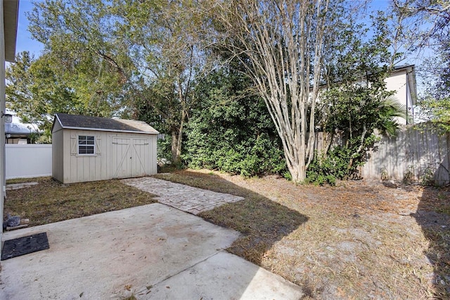 view of yard with a patio area and a shed