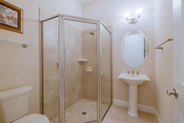 bathroom with walk in shower, tile patterned floors, and toilet