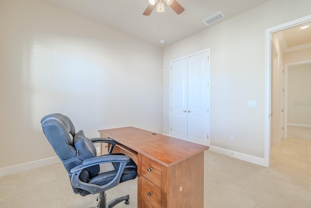 office space featuring ceiling fan and ornamental molding