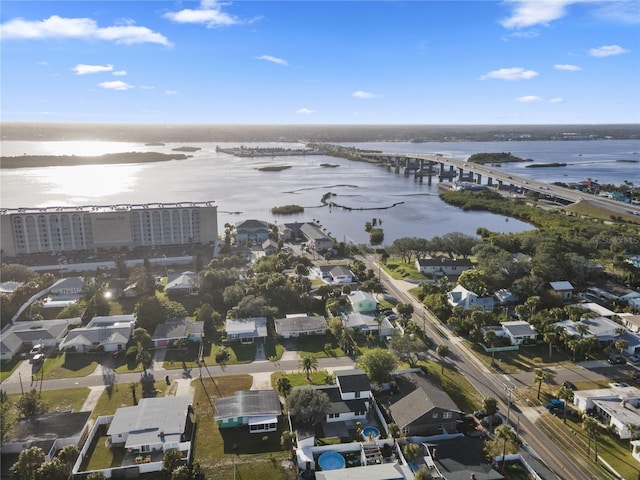 drone / aerial view with a water view