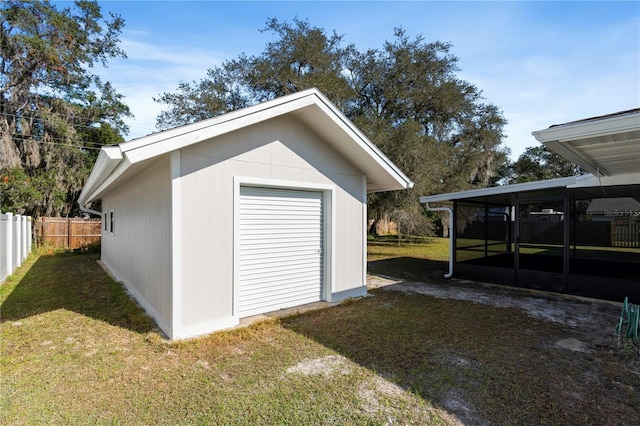 garage featuring a yard