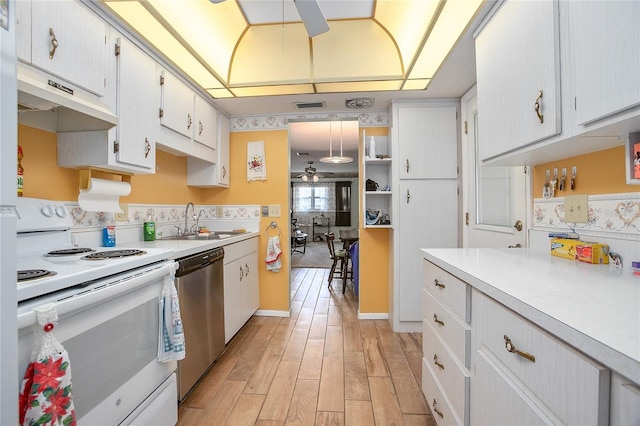 kitchen with sink, dishwasher, white range with electric stovetop, white cabinets, and light wood-type flooring