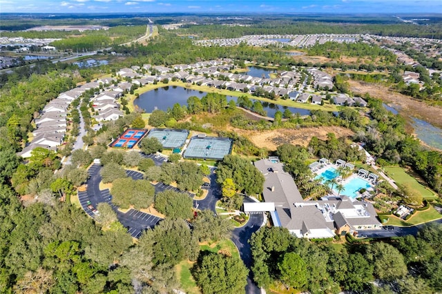 drone / aerial view with a water view