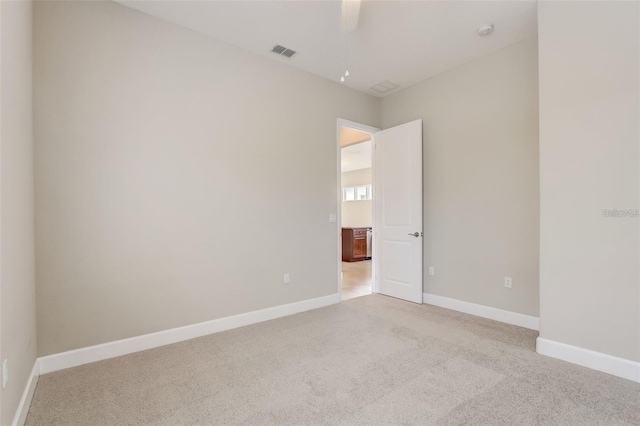 430 Cypress Hills Way, Deland, FL 32724 - unfurnished room featuring light colored carpet, ceiling fan, baseboards, and a smoke detector