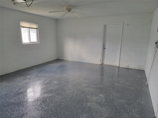 empty room featuring ceiling fan