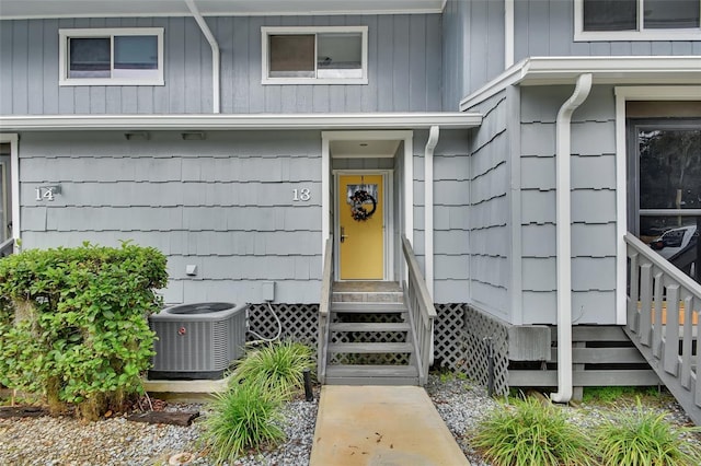 entrance to property featuring central AC unit