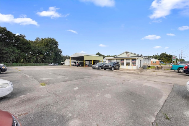 view of parking featuring a carport