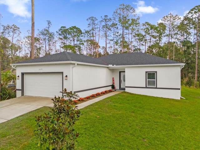 single story home featuring a garage and a front lawn