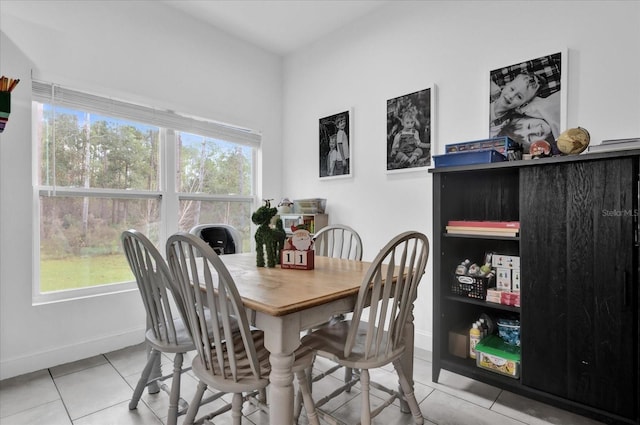 view of tiled dining space