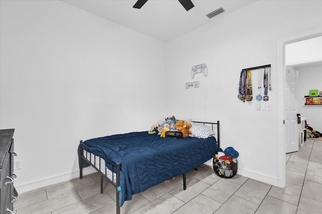 bedroom featuring ceiling fan and light tile patterned floors