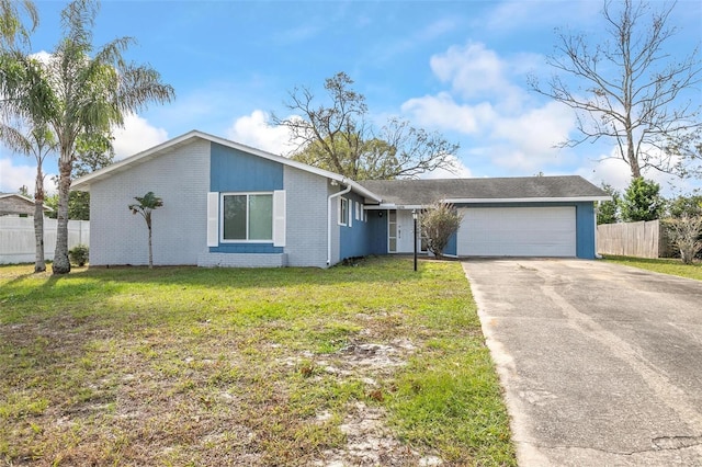 ranch-style house with a front yard and a garage